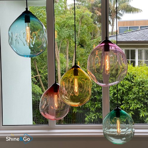 Colourful glass pendant lights, dusted and polished by Shine&Go NZ