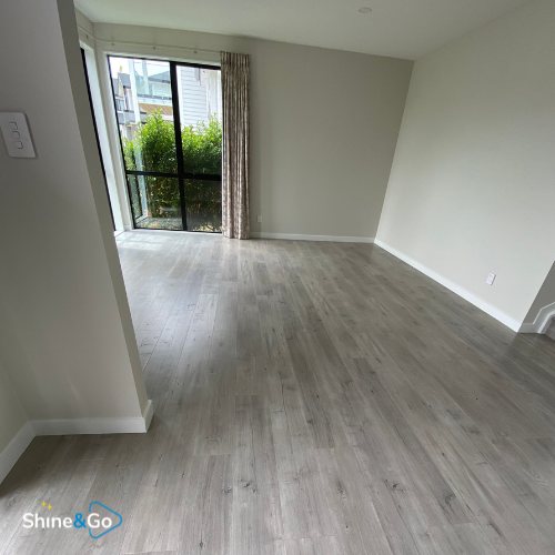 Living room with wood-look flooring cleaned by Shine&Go NZ